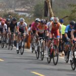 Pune Grand Tour 2026 Stage 2 race on Sinhagad Road with cyclists competing for yellow jersey