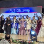 State-level fashion show event at Dayanand Kala Mahavidyalaya Latur with students performing confident ramp walk under bright stage lights.